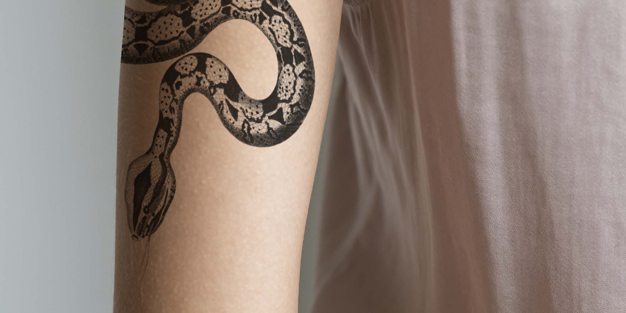 Closeup of arm tattoo of a woman
